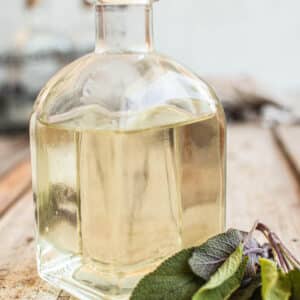 sage syrup in bottle.