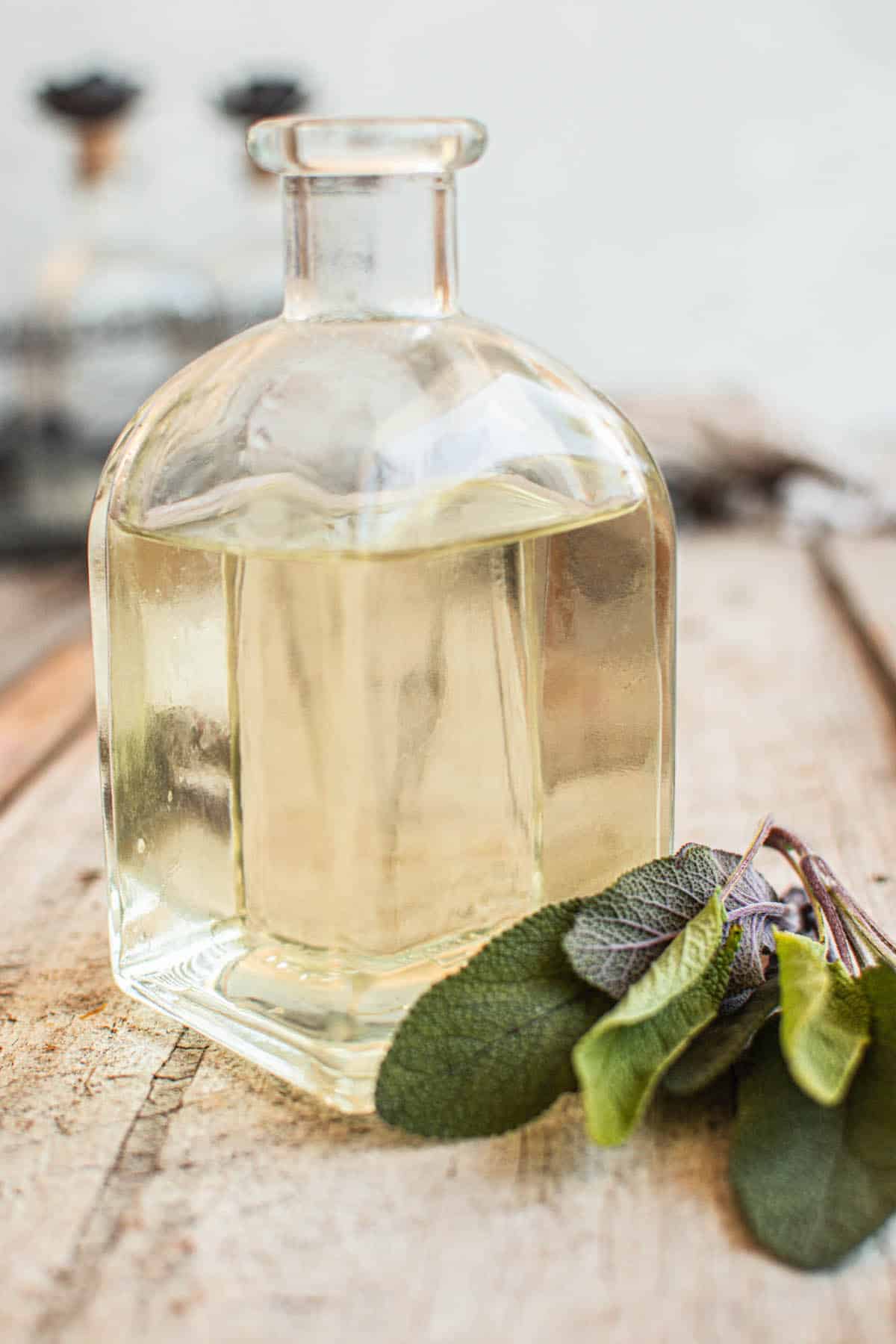 sage syrup in bottle.