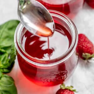 a spoon dripping syrup.