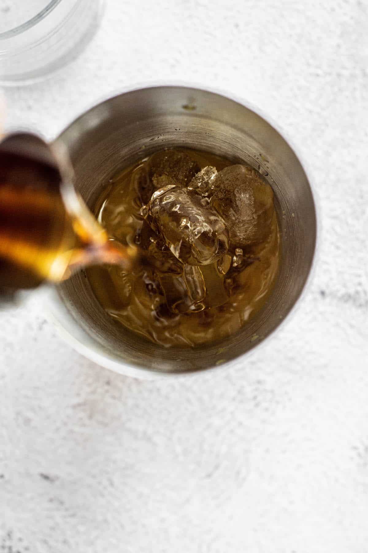 amaretto poured in a shaker.