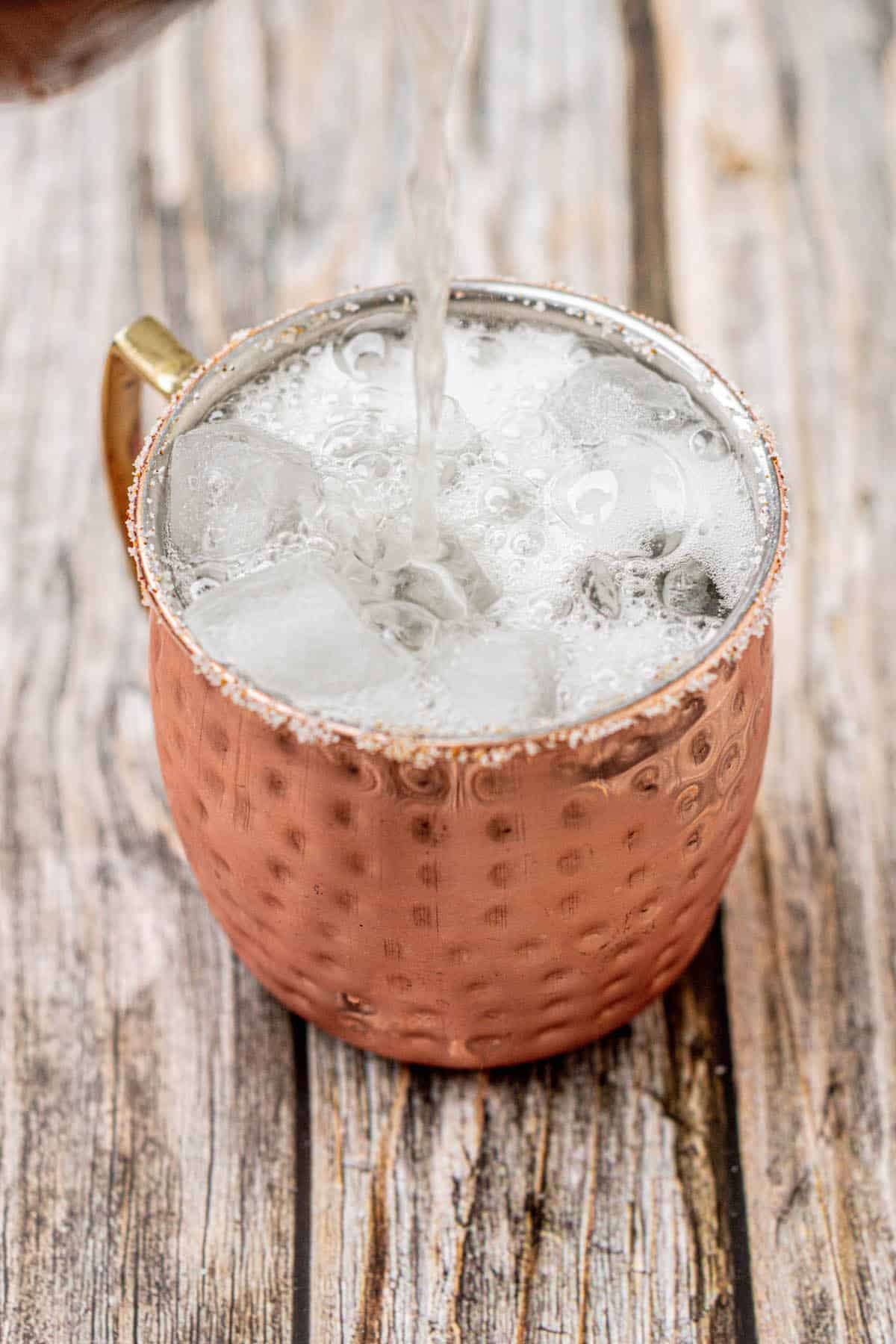 bubbly ginger beer poured over ice.