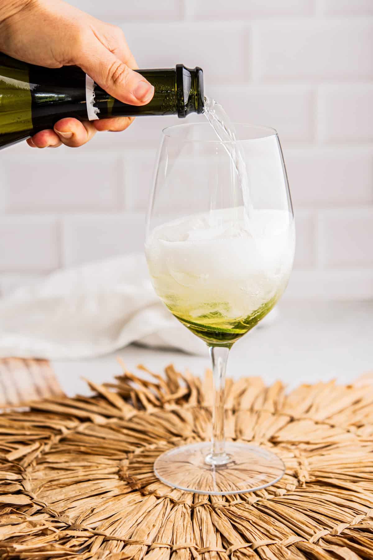 prosecco being poured.